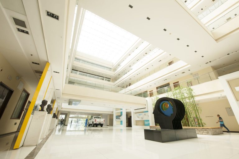 Atrium inside the FOTON headquarters in China, with a Tunland pickup on display