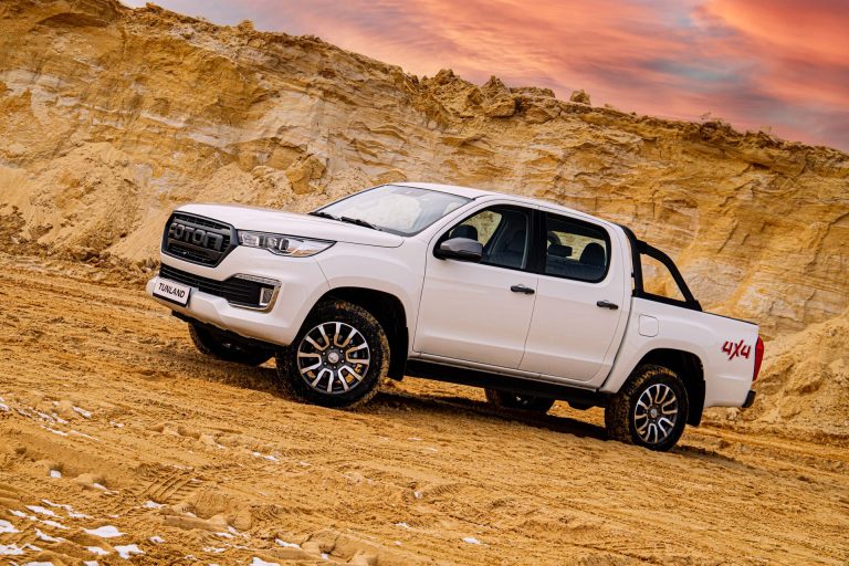 FOTON Tunland 4x4 double-cab pickup driving on an unpaved road