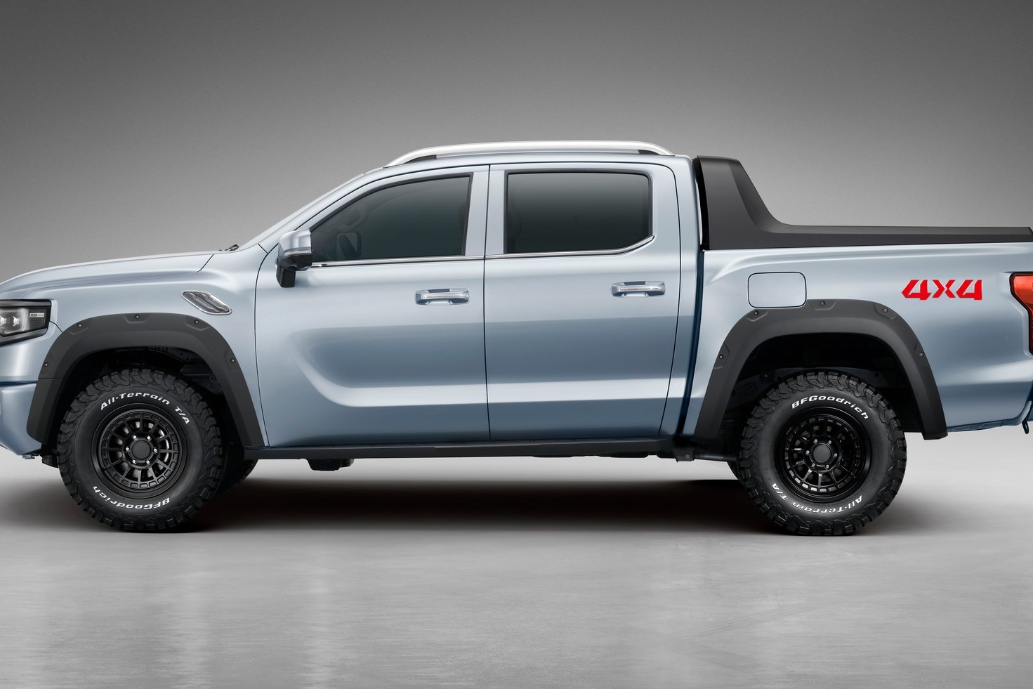 Side view of a silver FOTON Tunland Hybrid double-cab pickup